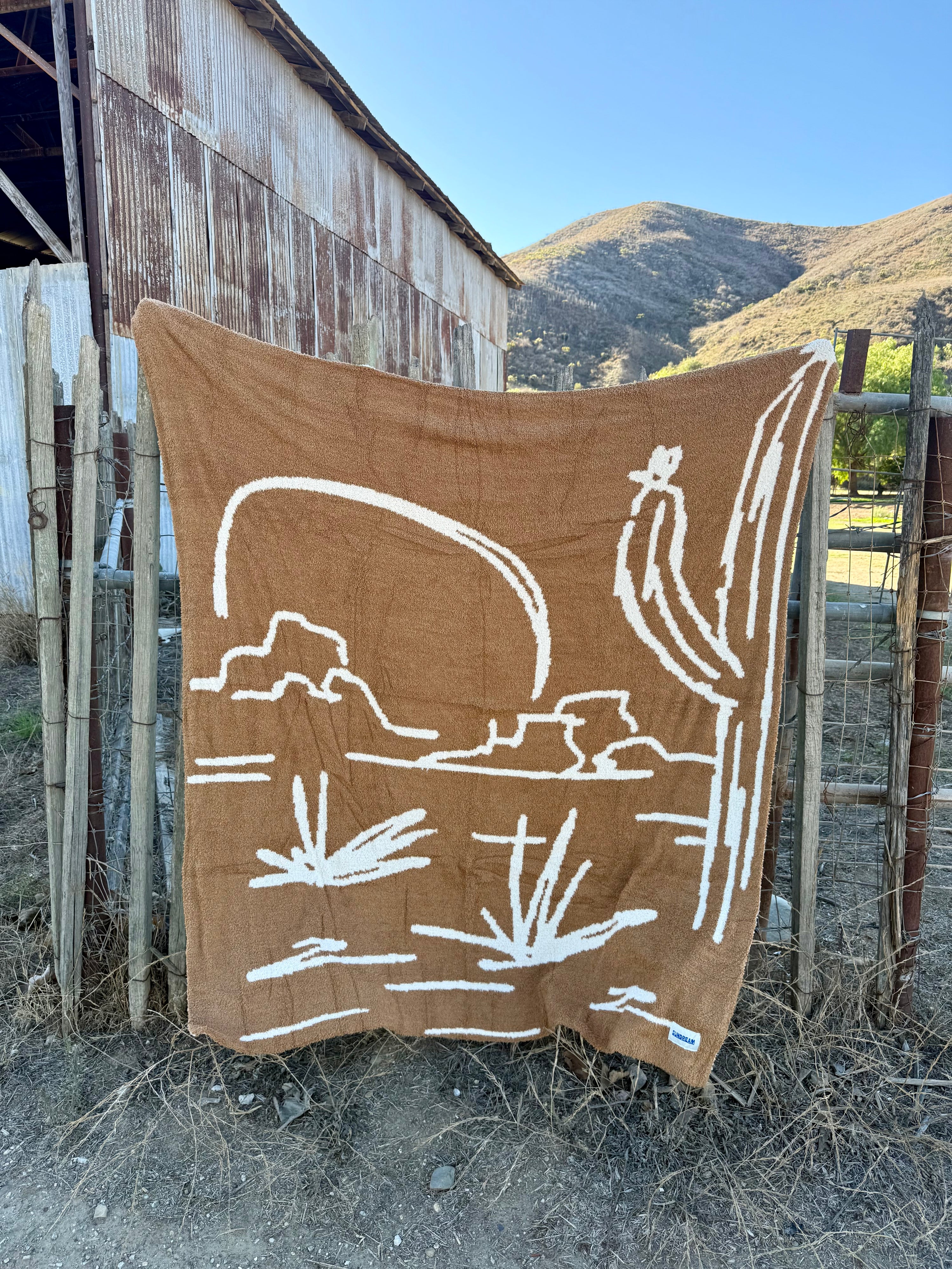 Out West Plush Throw - Saddle Brown