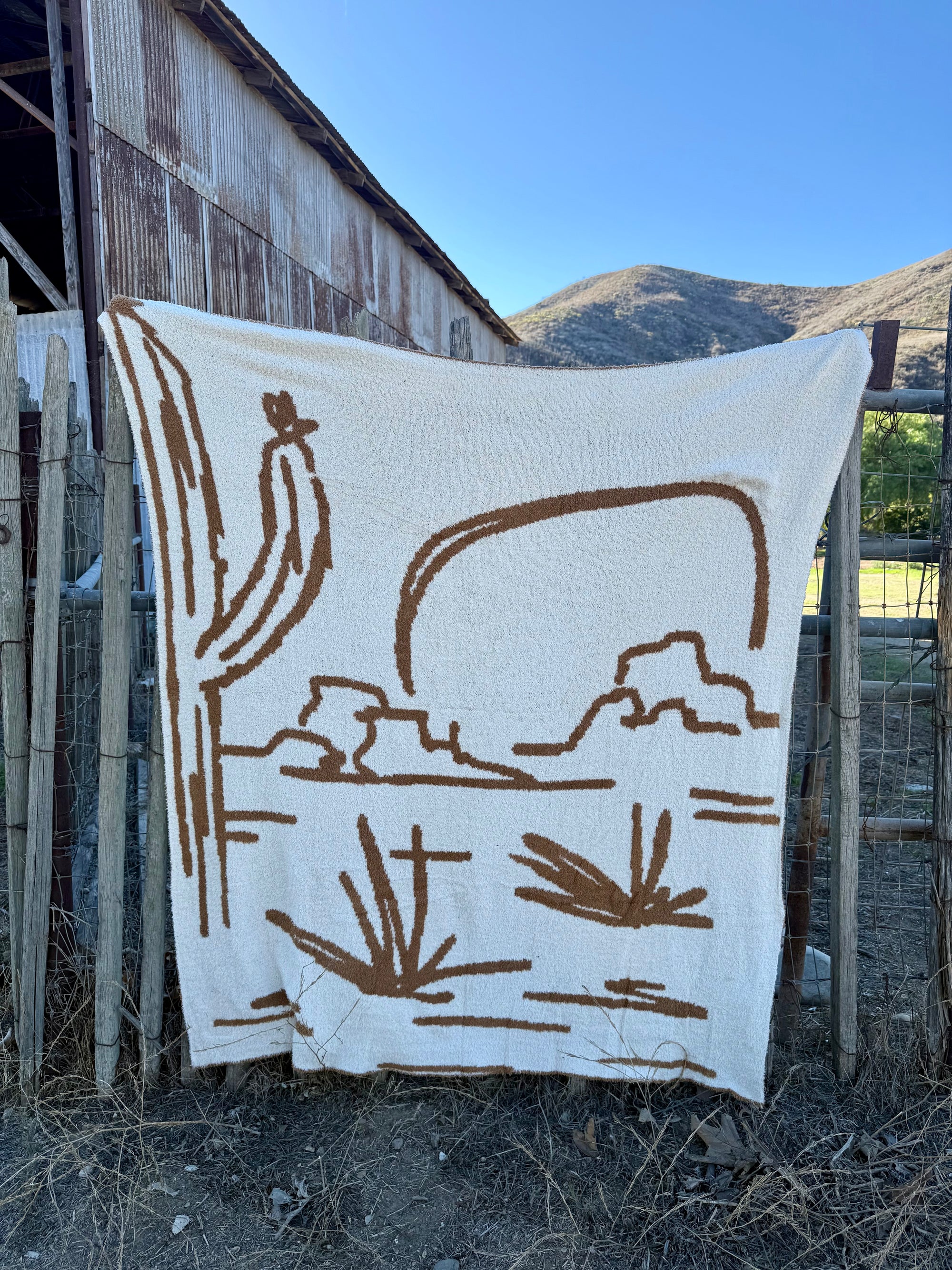 Out West Plush Throw - Saddle Brown